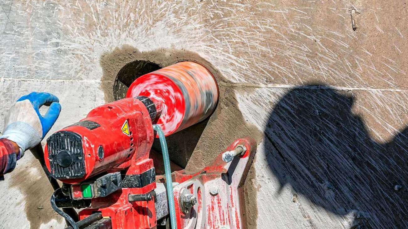 Concrete core drilling in progress on a Cut 'N Core job
